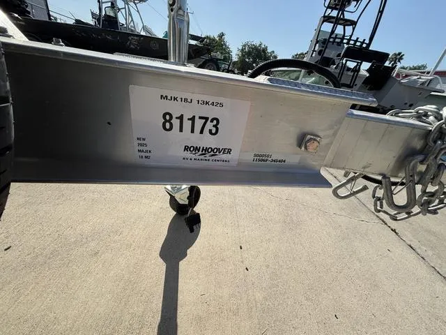 Slide: The Image of Trailer hitch with Majek 18 M2 label, Ron Hoover Marine Center, 2025 model. - 6