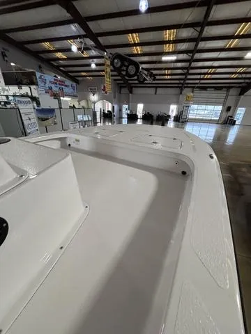 Slide: The Image of 2025 Majek 24 Reaper boat interior in showroom, showcasing sleek design and spacious layout. - 7