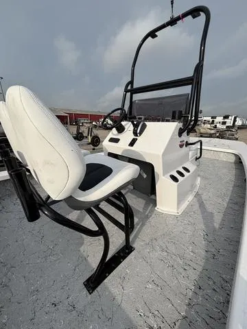 Slide: The Image of 2025 Majek 2206 Illusion boat console with seating, featuring modern design and controls. - 5