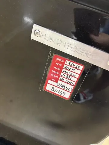 Slide: The Image of 2025 Majek 21 RFL boat identification plate with stock and VIN details. - 8