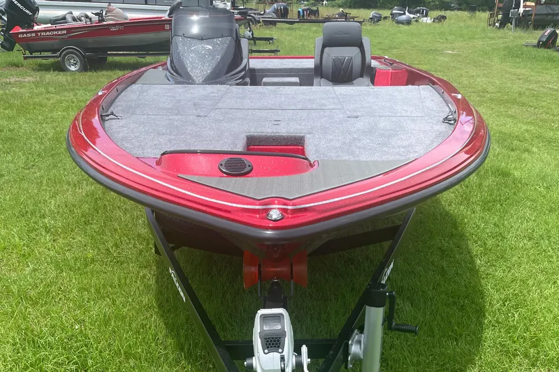 Slide: The Image of 2025 Falcon Boats F215, red, parked on grass, front view. - 3