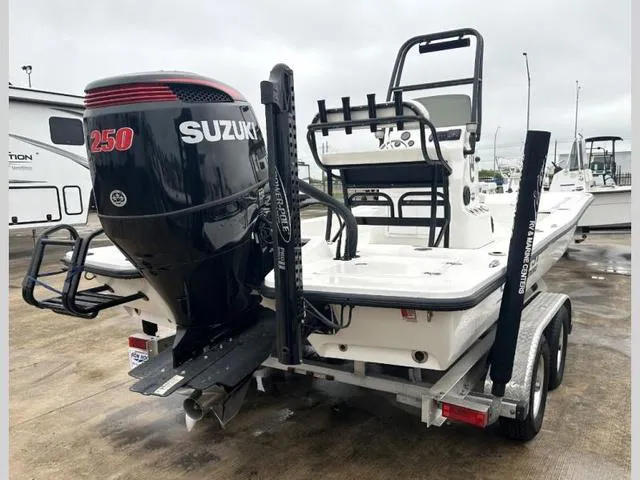 Slide: The Image of 2023 Catalyst Boat Works 2200 CAT with Suzuki 250 engine on trailer. - 6