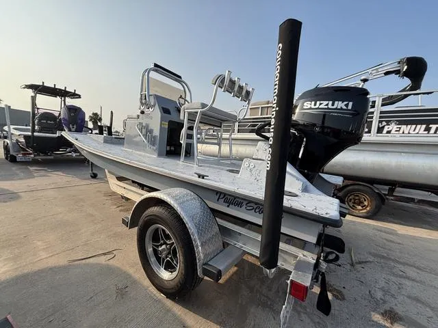 Slide: The Image of 2024 Cougar Marine Payton Scooter boat on trailer with Suzuki outboard motor. - 3