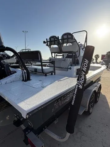 Slide: The Image of 2022 Majek 25 ILLUSION boat on trailer, featuring a sleek design and modern equipment. - 8