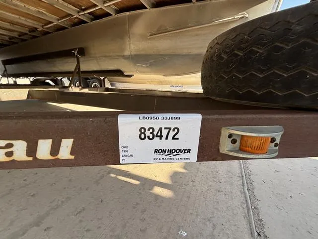 Slide: The Image of Trailer with Landau 20 boat, 1999 model, Ron Hoover RV & Marine Centers label. - 7