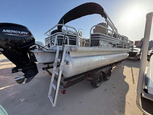 Slide: The Image of 2021 Sun Tracker FISH BARGE 20 pontoon boat on trailer, featuring Mercury outboard motor. - 3