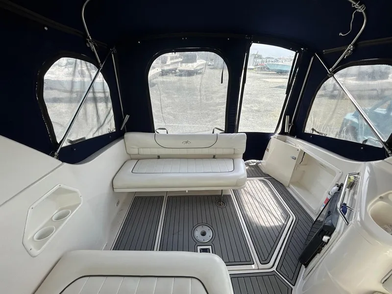 Slide: The Image of 2003 Monterey 302 Cruiser interior with seating and canopy, showcasing elegant design and comfort. - 11