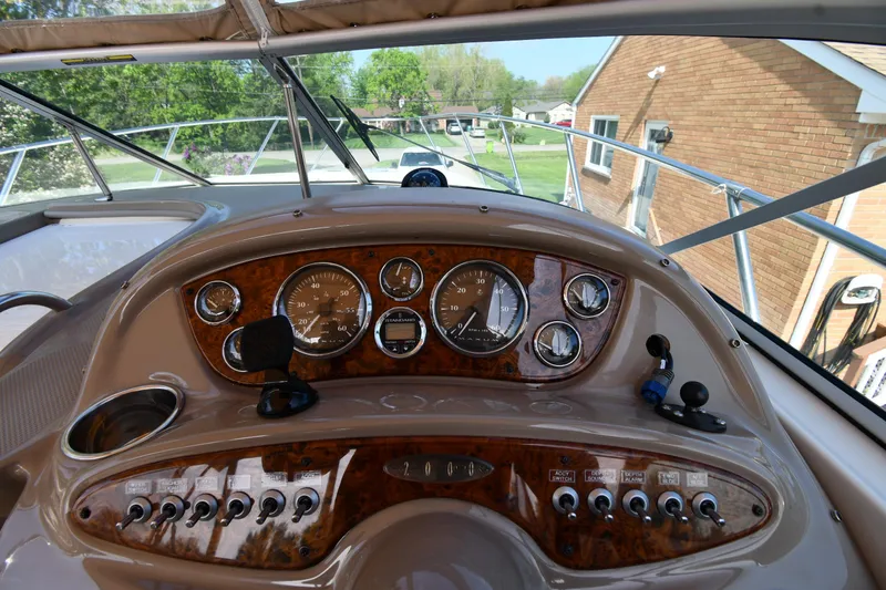 Slide: The Image of Cockpit view of 2000 Maxum 2700 SCR boat with detailed instrument panel. - 13