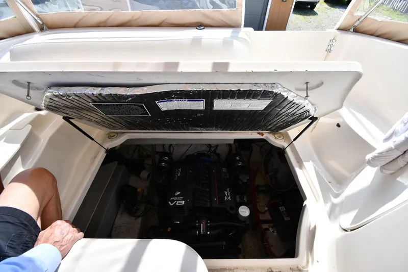 Slide: The Image of 2000 Maxum 2700 SCR boat engine compartment with V8 engine visible. - 45