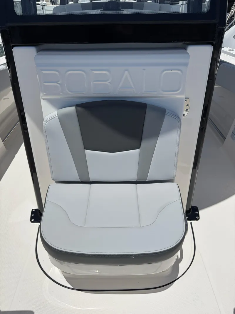 Slide: The Image of 2025 Robalo R270 Center Console boat seat with sleek design and comfortable cushioning. - 29