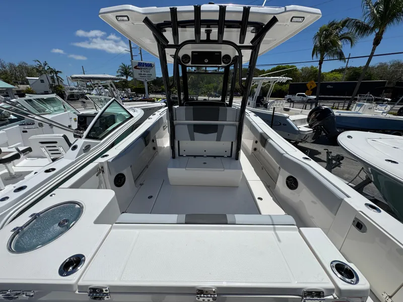 Slide: The Image of 2025 Robalo R270 Center Console boat with spacious deck and modern design. - 3