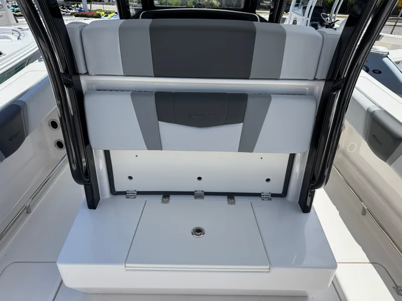 Slide: The Image of 2025 Robalo R270 Center Console boat interior with sleek seating and storage features. - 5