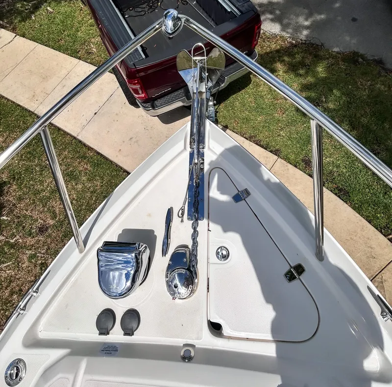 Slide: The Image of Bow view of 2023 Regal 26 XO boat with anchor and chrome fittings. - 20