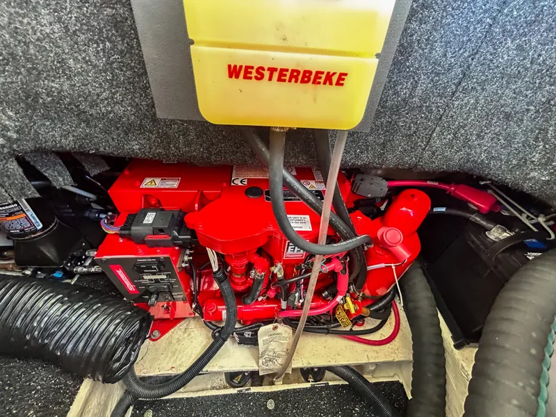 Slide: The Image of Engine compartment of 2023 Regal 26 XO boat with Westerbeke generator. - 22