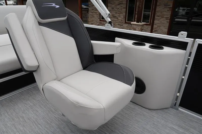 Slide: The Image of 2025 Bennington S Swingback 22 SSB Limited boat seat with cup holders and modern design. - 16