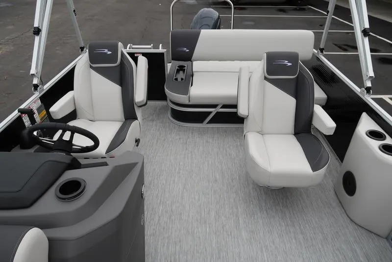 Slide: The Image of 2025 Bennington S Swingback 22 SSB Limited pontoon boat interior with plush seating and modern design. - 17