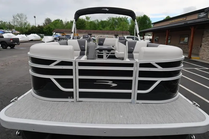 Slide: The Image of 2025 Bennington S Swingback 22 SSB Limited pontoon boat with sleek seating and modern design. - 3
