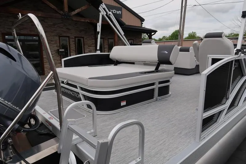 Slide: The Image of 2025 Bennington S Swingback 22 SSB Limited pontoon boat with sleek seating and modern design. - 5