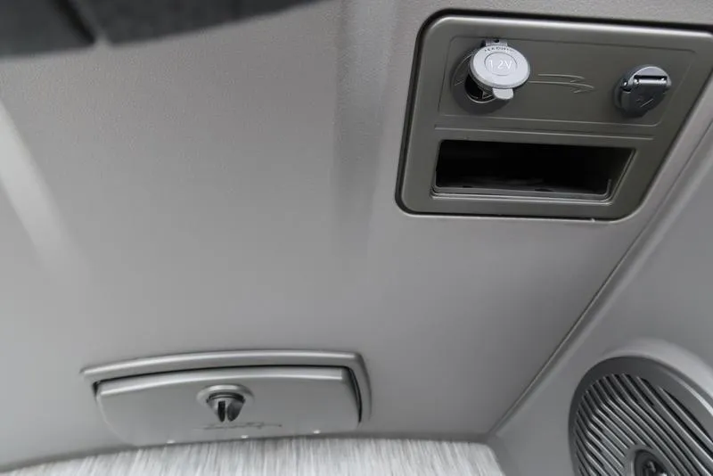 Slide: The Image of 2025 Bennington S Swingback 22 SSB Limited dashboard with controls and speaker. - 9