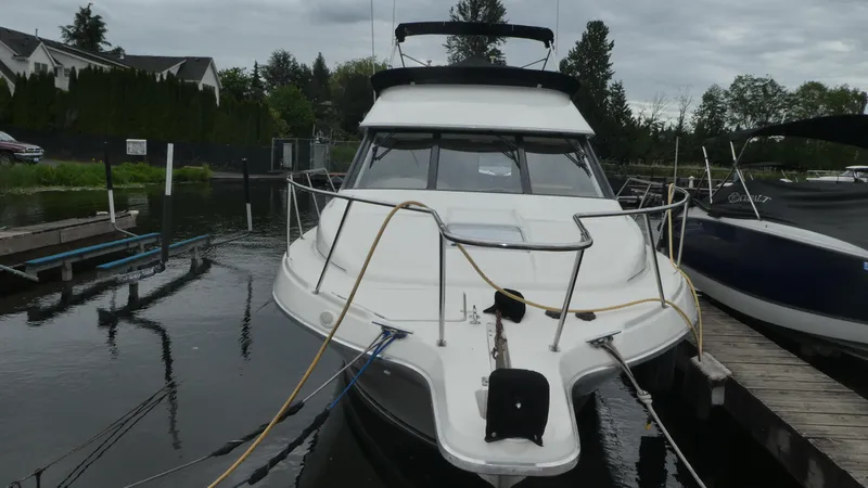 Slide: The Image of 1996 Bayliner 3488 Avanti Command Bridge docked at marina. - 38