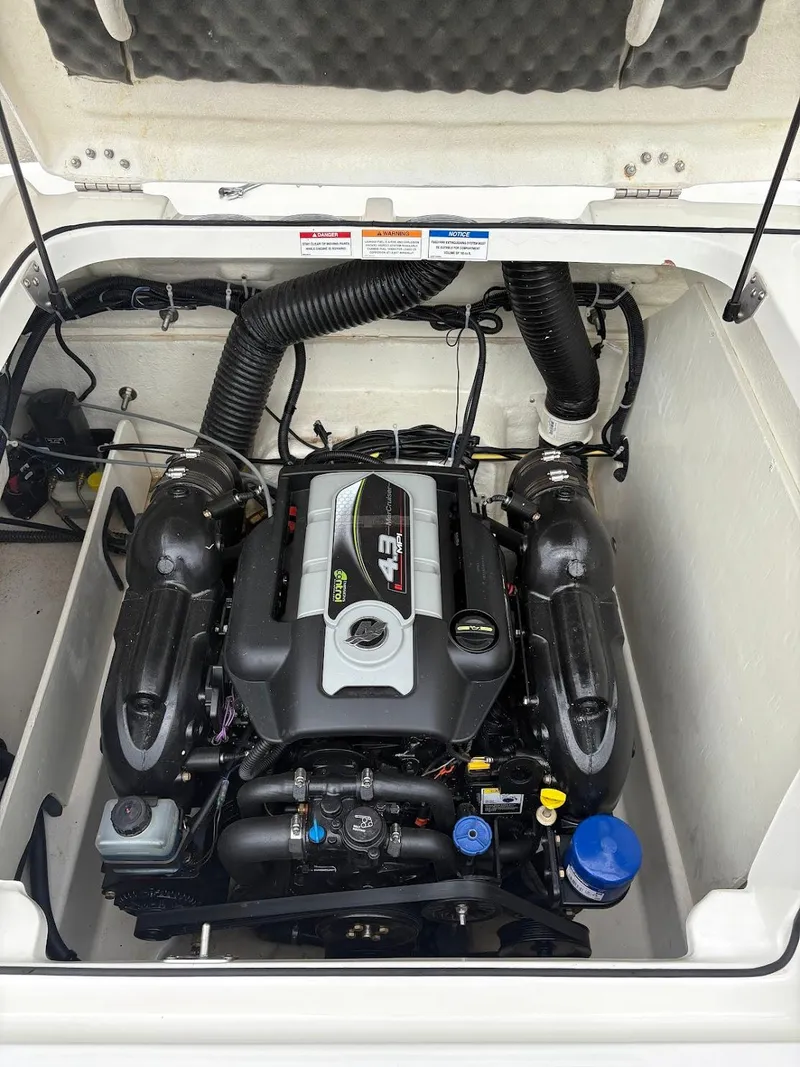 Slide: The Image of 2017 Bayliner VR5 Bowrider engine compartment with 4.3L engine, detailed view. - 16
