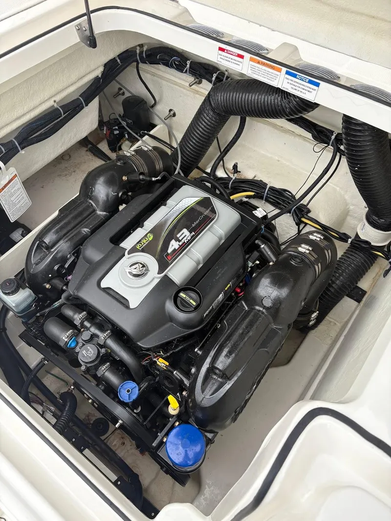 Slide: The Image of 2017 Bayliner VR5 Bowrider engine compartment with 4.5L engine, detailed view. - 17