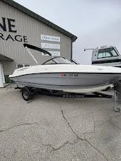 Slide: The Image of 2017 Bayliner VR5 Bowrider on trailer outside storage facility. - 4