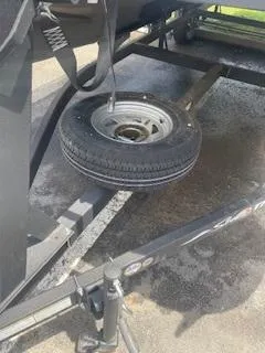 Slide: The Image of Spare tire on Sun Tracker Bass Buggy 18 DLX trailer, 2023 model. - 7