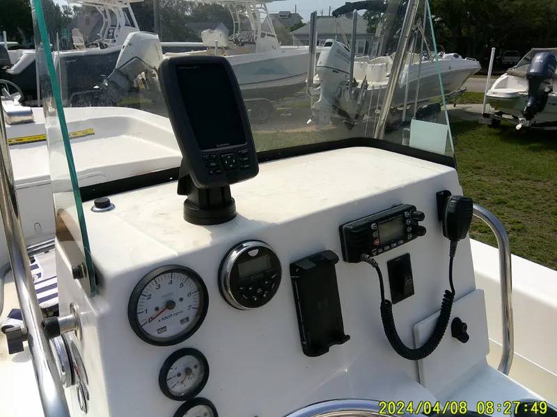 Slide: The Image of Control panel of a 2015 Sundance B22CCR boat with navigation and communication equipment. - 17