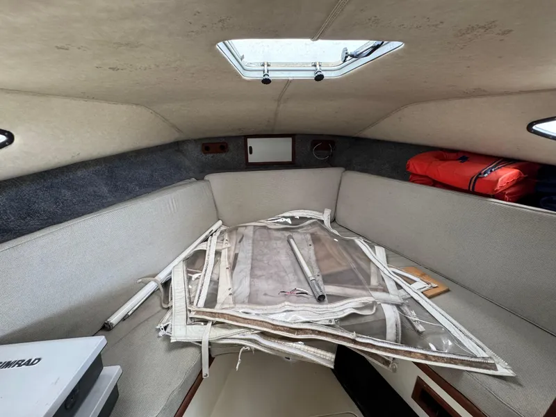 Slide: The Image of Interior cabin of 1985 Blackfin 29 Combi Express boat with storage and equipment. - 8