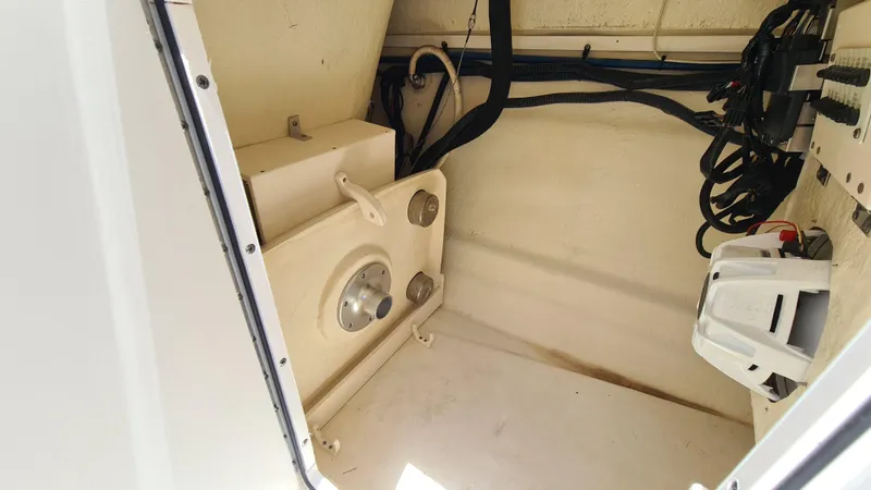 Slide: The Image of Interior view of 2018 Chaparral Suncoast 250 Deluxe boat compartment. - 19