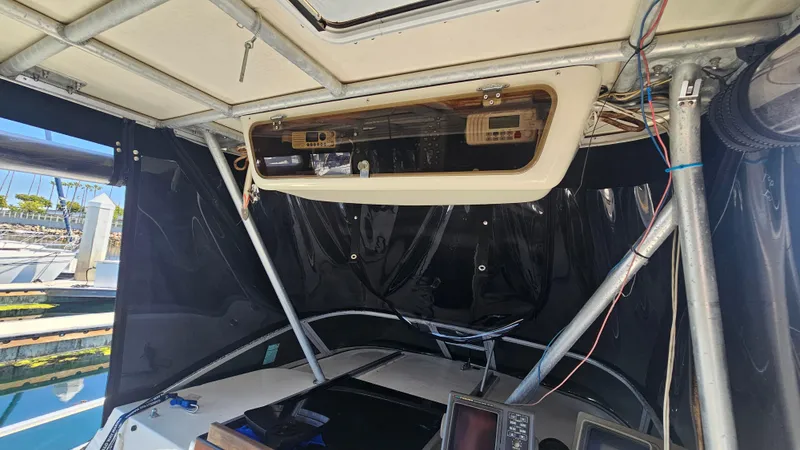 Slide: The Image of 1992 Luhrs Tournament 300 boat interior with navigation equipment and control panel. - 18