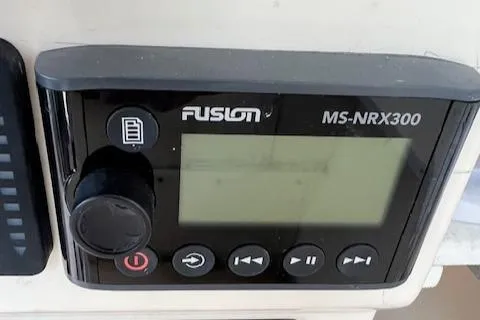 Slide: The Image of Fusion MS-NRX300 marine stereo controller on Parker 2520 Modified Vee Sport Cabin, 1989 model. - 11