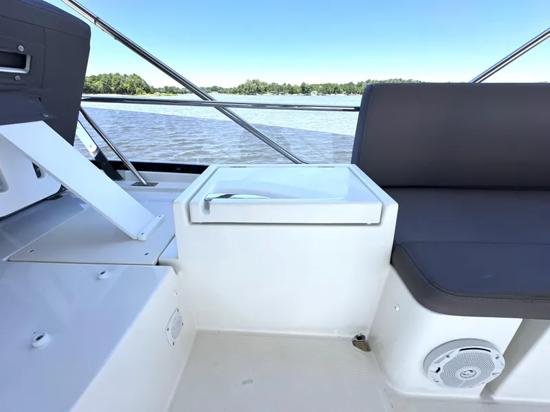 Slide: The Image of Prestige 500 yacht interior, 2017 model, featuring seating and water view. - 24
