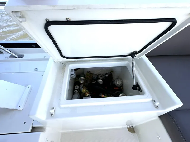Slide: The Image of Open cooler with drinks on a 2017 Prestige 500 yacht deck. - 25