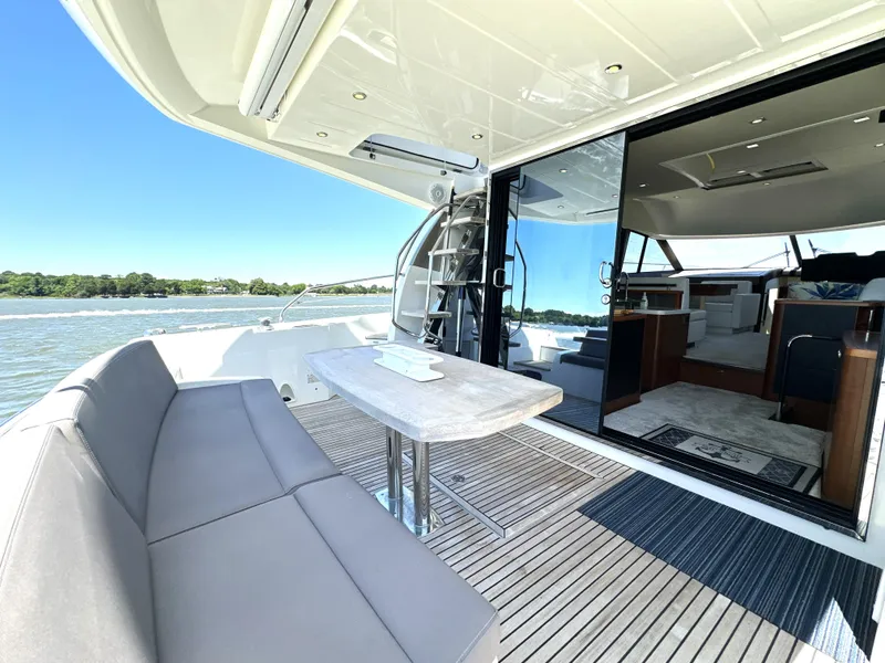 Slide: The Image of Luxury 2017 Prestige 500 yacht with spacious deck and modern interior. - 41