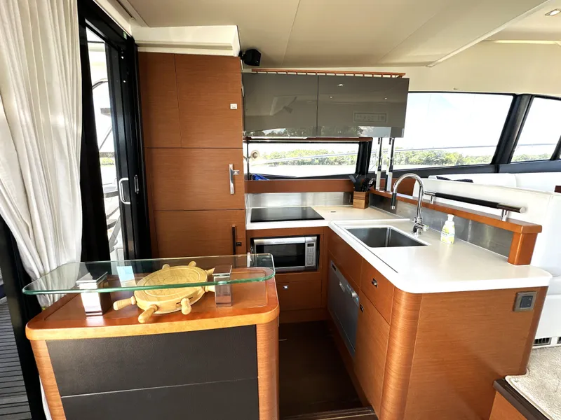 Slide: The Image of Luxurious kitchen interior of a 2017 Prestige 500 yacht with modern amenities. - 44