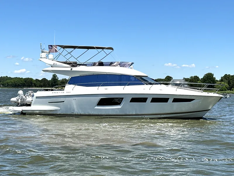 Slide: The Image of 2017 Prestige 500 yacht cruising on a sunny day with clear skies. - 6