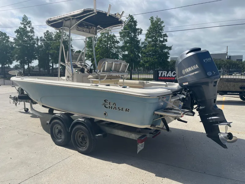 Slide: The Image of 2015 Sea Chaser 210 LX Bay Runner boat with Yamaha outboard motor on trailer. - 6