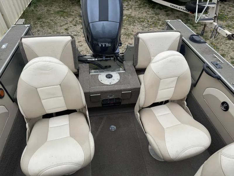 Slide: The Image of 2004 Alumacraft Trophy 175 boat with Yamaha 115 outboard motor in garage. - 6