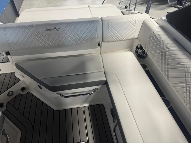 Slide: The Image of Luxurious seating on 2025 Sea Ray SDX 250 boat, featuring elegant white upholstery. - 11