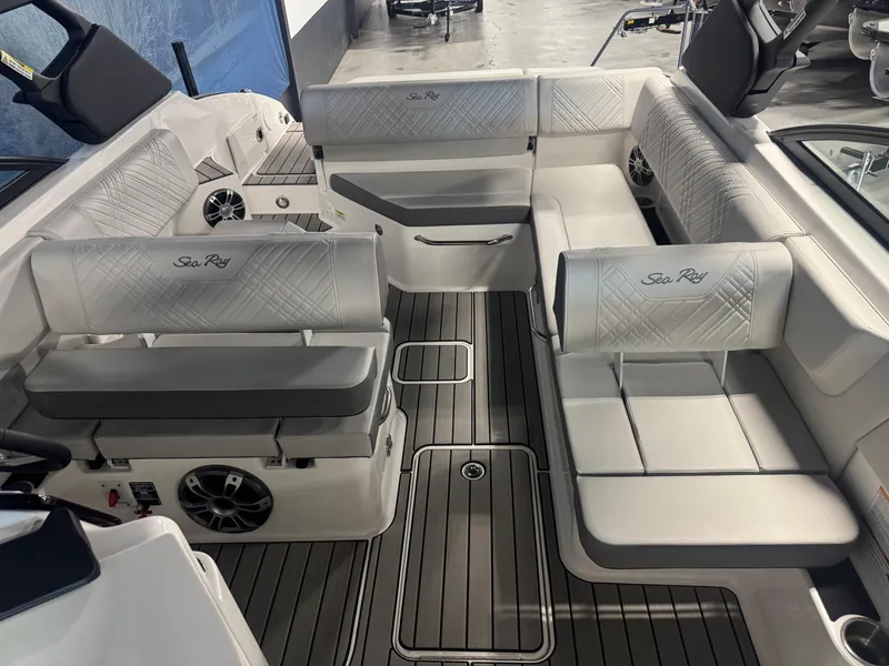 Slide: The Image of 2025 Sea Ray SDX 250 boat interior with luxurious seating and modern design. - 13