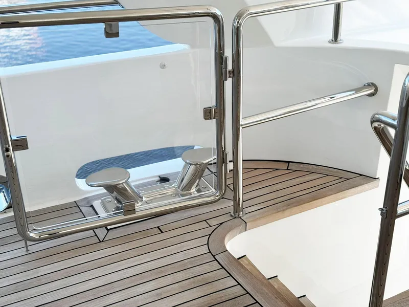 Slide: The Image of Teak deck and stainless steel railings on 1996 Cheoy Lee 145 Global Series yacht. - 11