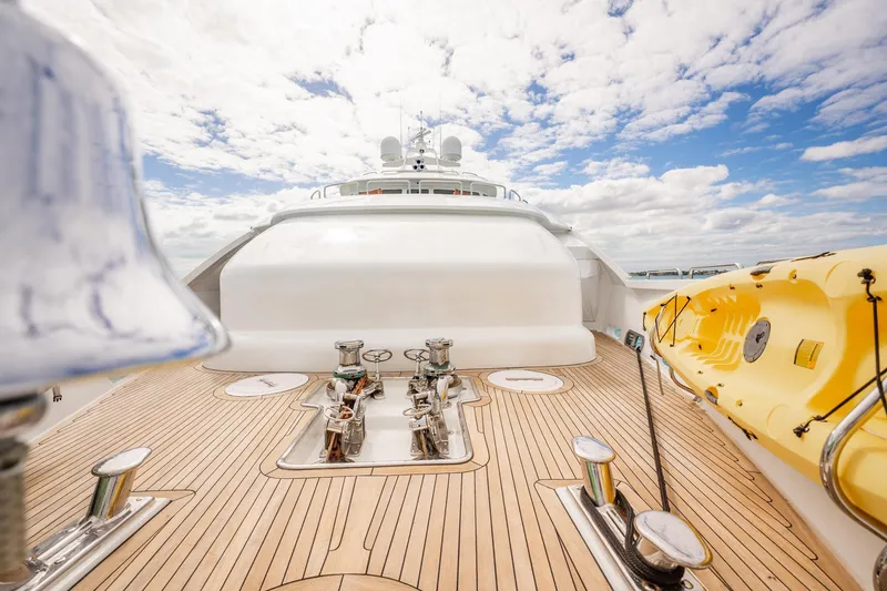 Slide: The Image of Luxurious 1996 Cheoy Lee 145 Global Series yacht deck with clear sky and ocean view. - 20