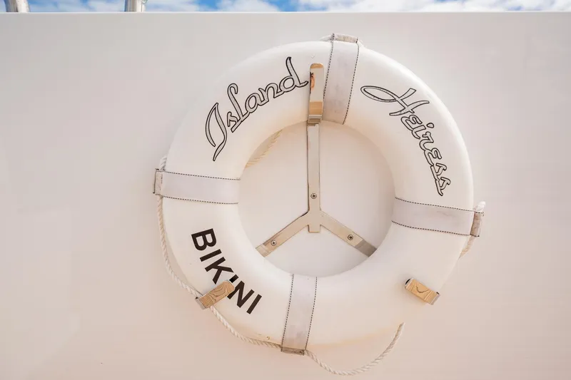 Slide: The Image of Life ring on Cheoy Lee 145 yacht, featuring "Island Heiress" and "BIKINI" text. - 27