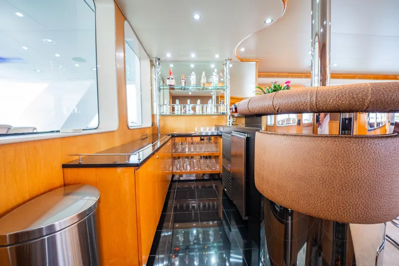 Slide: The Image of Luxurious bar area on 1996 Cheoy Lee 145 Global Series yacht with modern design. - 40