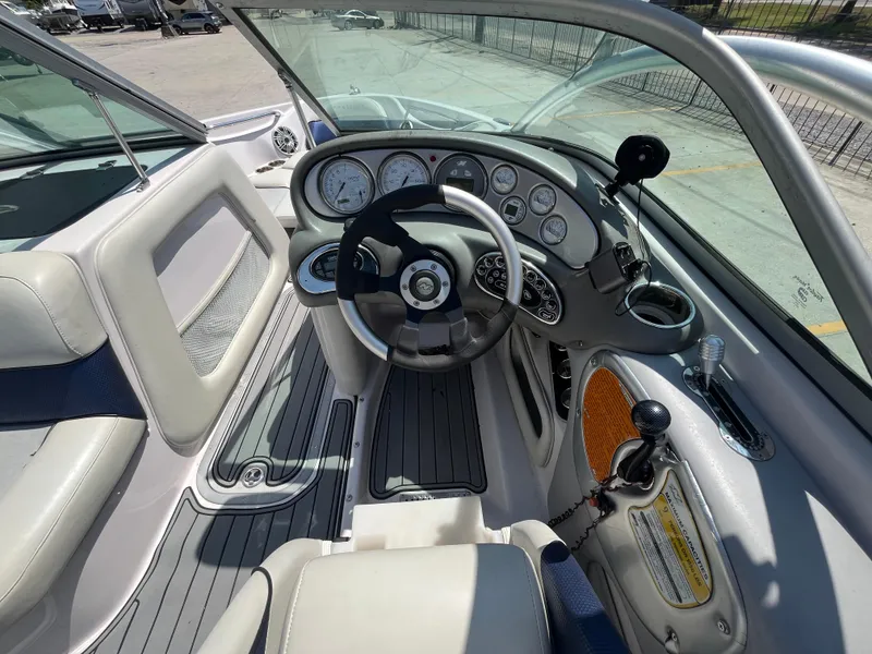 Slide: The Image of 2006 Nautique Air SV-211 Team boat dashboard with steering wheel and gauges. - 10
