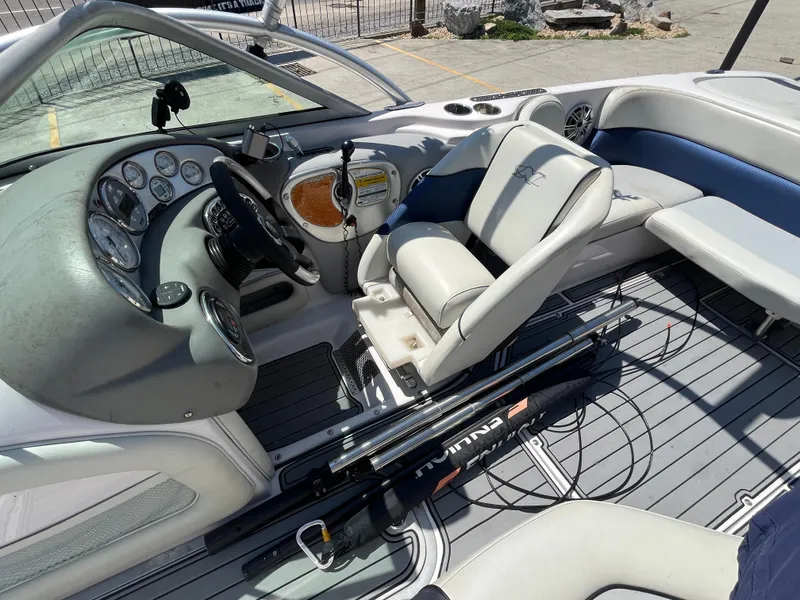 Slide: The Image of 2006 Nautique Air SV-211 Team boat interior with steering wheel and seating. - 16