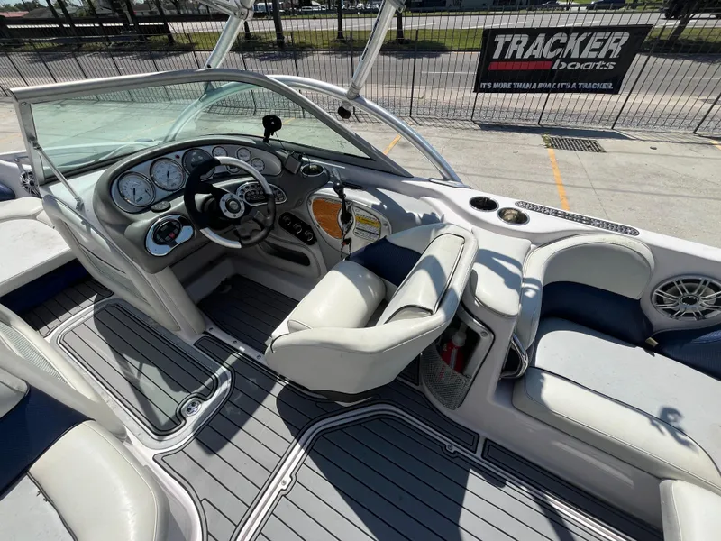 Slide: The Image of 2006 Nautique Air SV-211 Team boat interior with steering wheel and seating. - 9