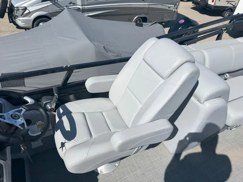 Slide: The Image of Luxurious seating in the 2024 Regency 230 DL3 boat, featuring plush, ergonomic design. - 10